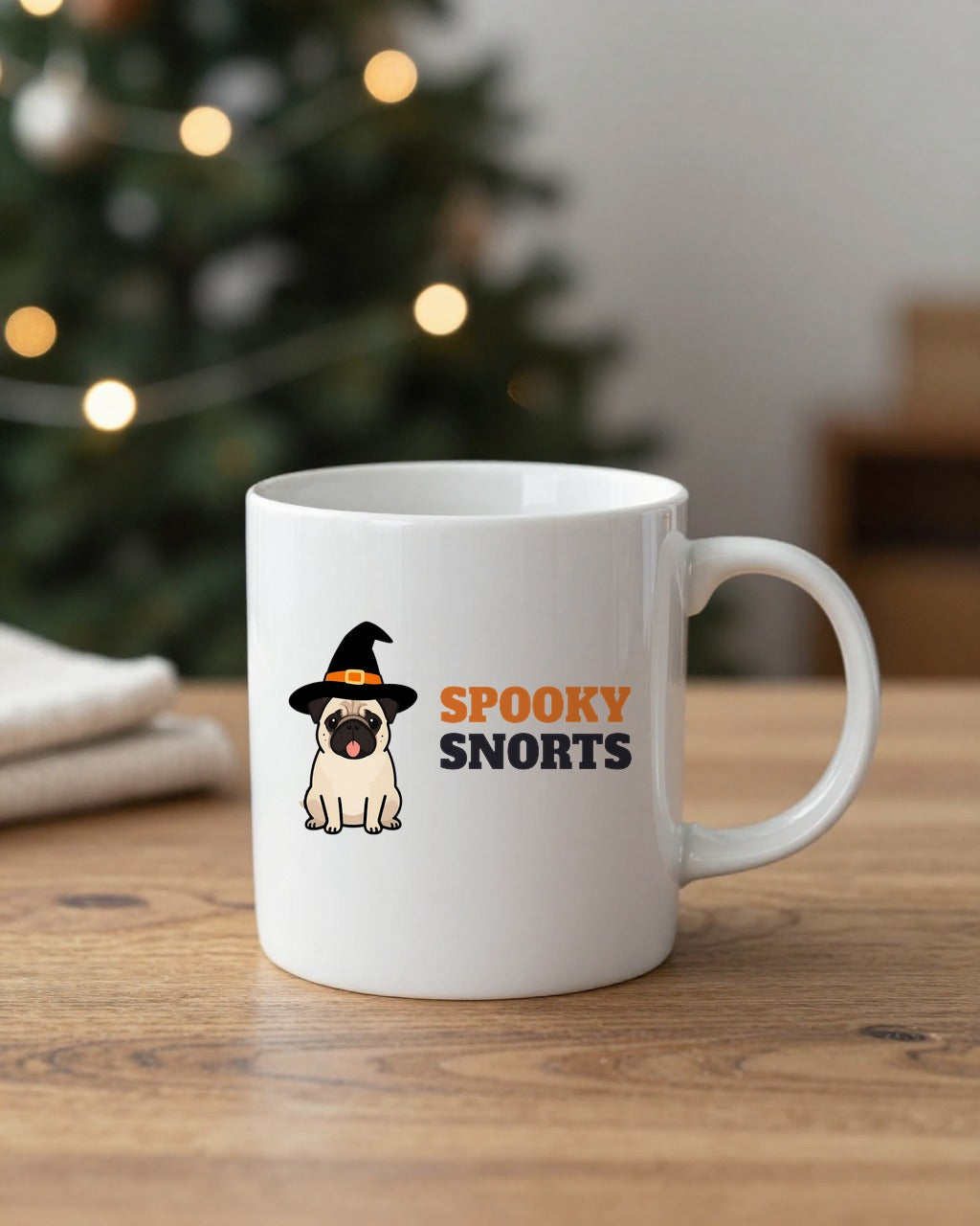 Spooky Snorts Halloween pug mug on a table